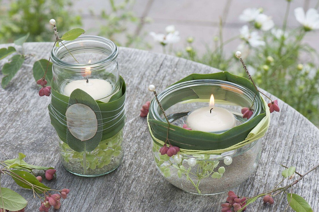 Preserving jars with floating candles as lanterns