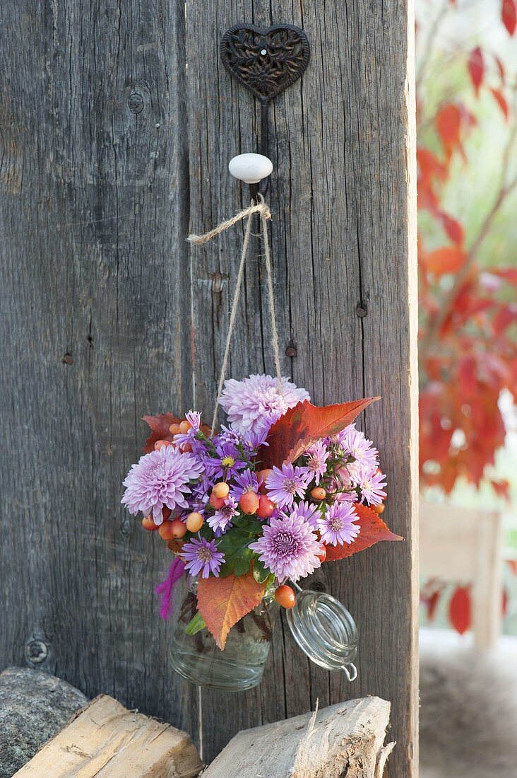 Small bouquet made of chrysanthemum (autumn chrysanthemum), aster