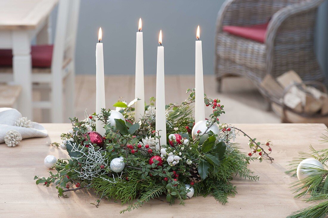 Advent wreath out of mixed branches green-white-red
