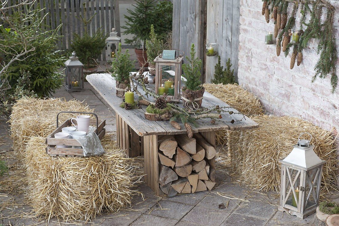 Rural winter terrace with straw bales to sit on