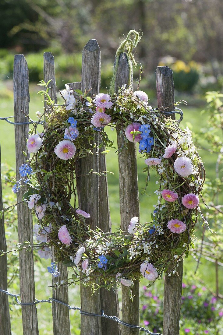 Wicker wreath with spring flowers