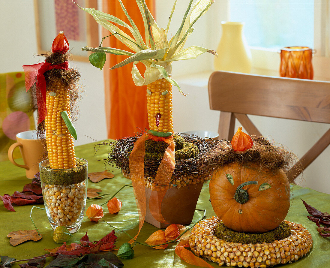 Corncobs, pumpkin faces, wreath of corn kernels, physalis