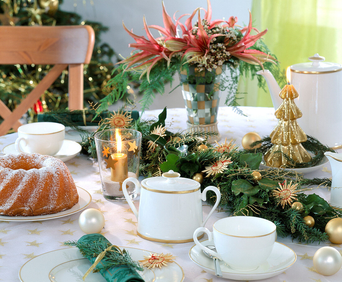 Table decoration garland of fir branches, Hedera ivy, Pinus pine, straw star