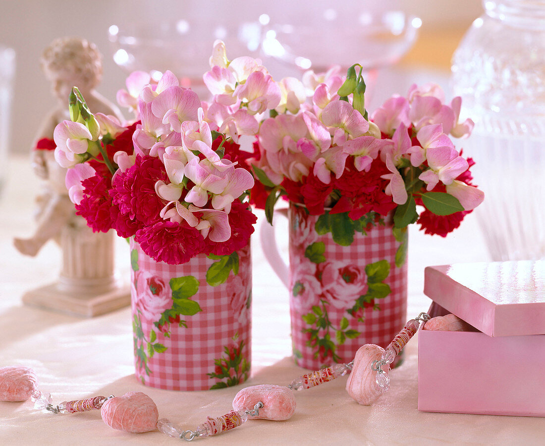Rose cups with rose petals and Lathyrus (sweetpea)