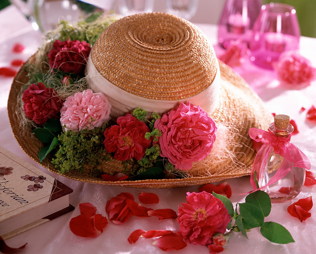 Deco with roses, straw hat with historical roses, alchemilla