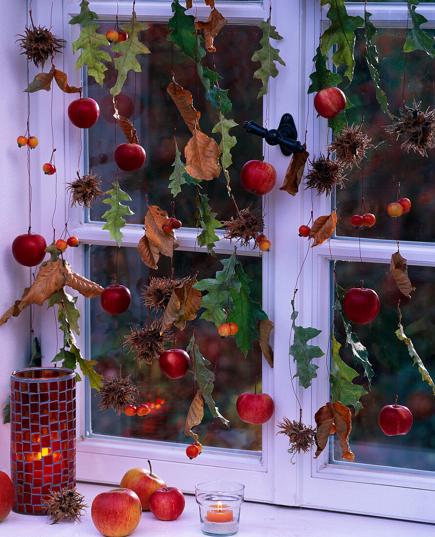 Window decoration of apples and foliage