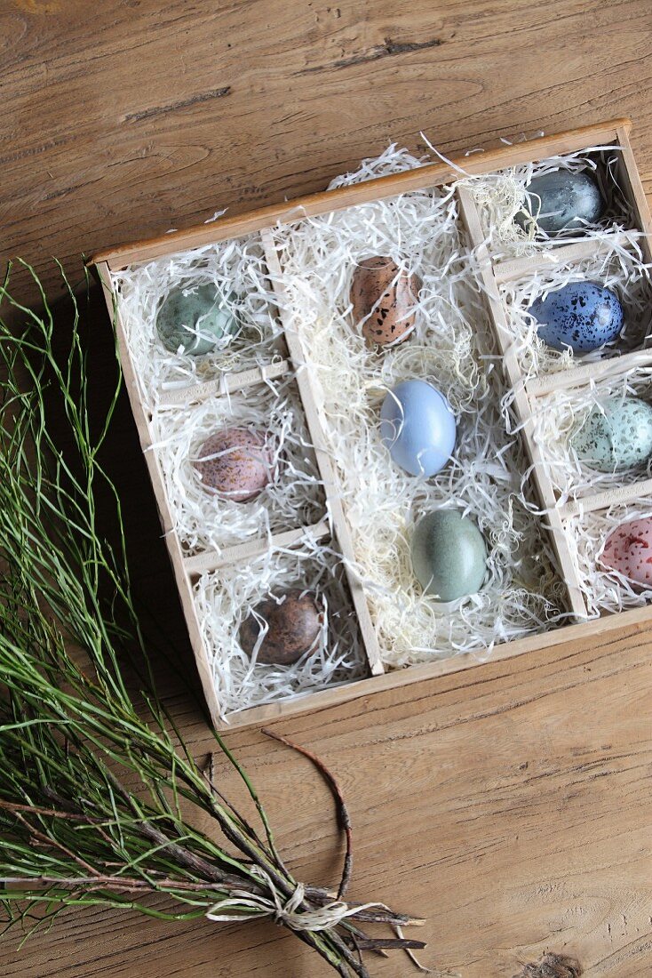 Speckled Easter eggs in display case made from old drawer