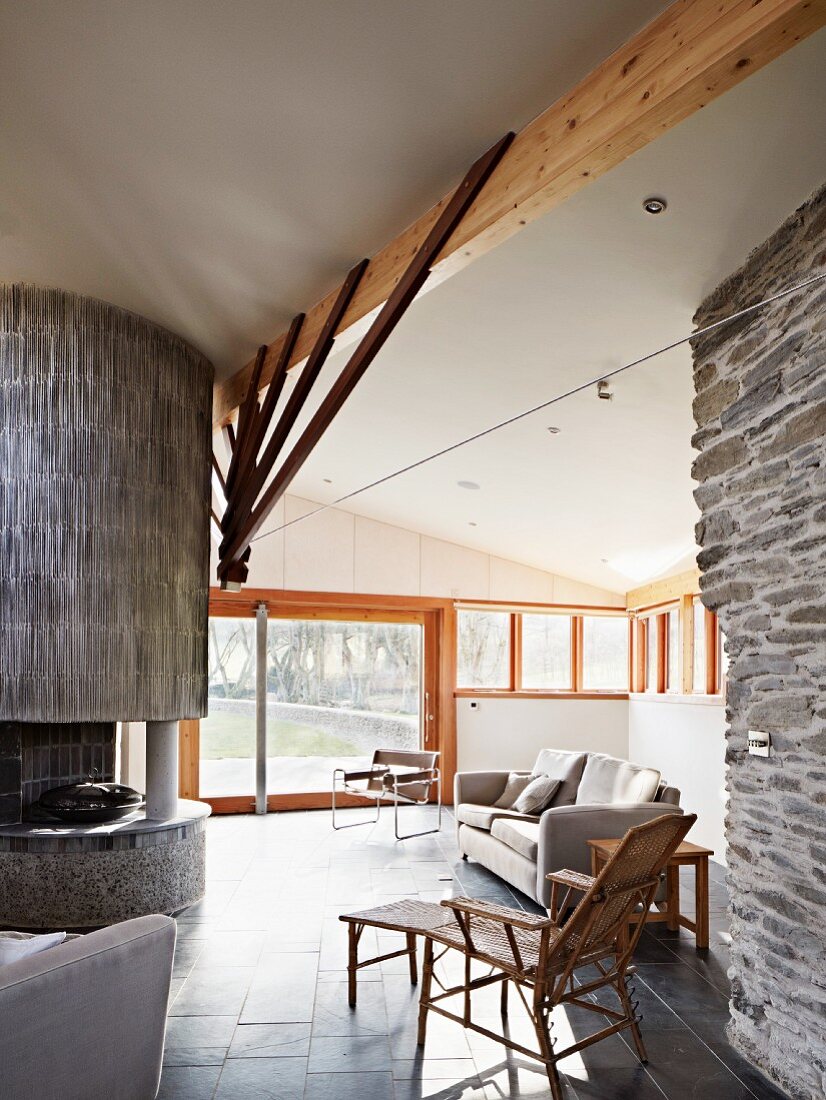Living room with stone walls in modern house