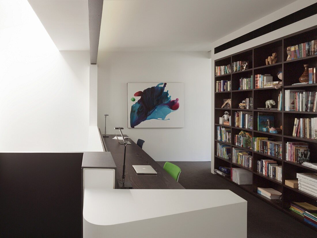 Bookshelves in study on gallery