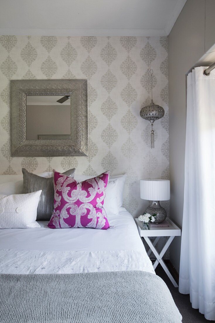 Patterned wallpaper in elegant bedroom
