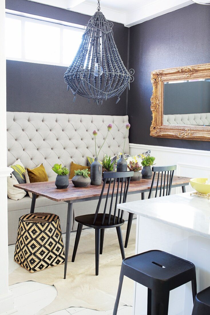 Eclectic dining room in dark grey and white