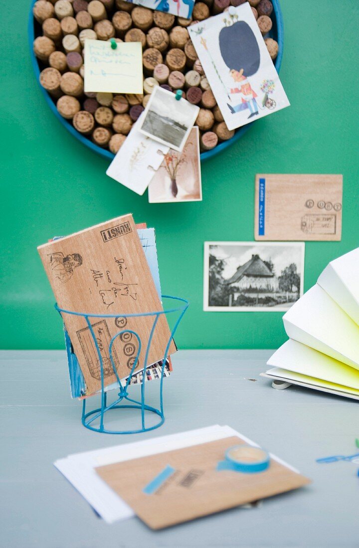 Pinboard made of corks and wooden postcards