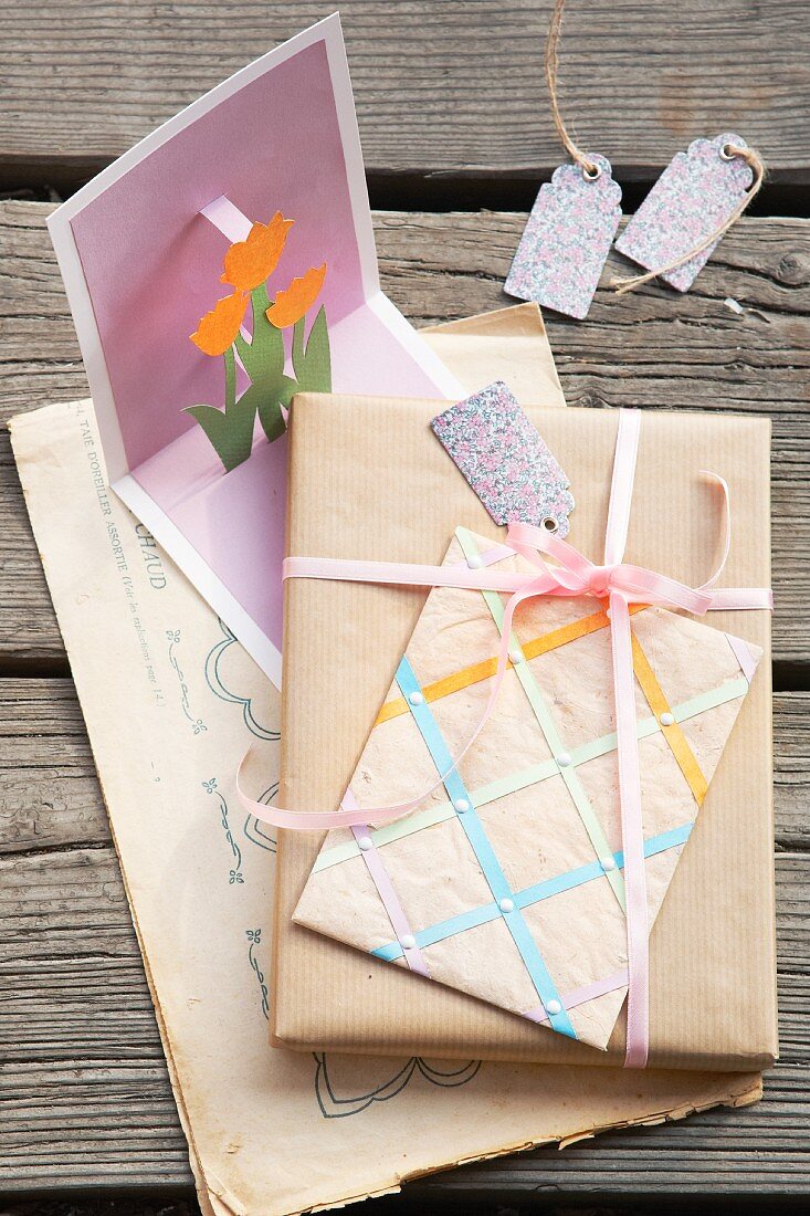 Gift with hand-made wrapping paper and pop-up card