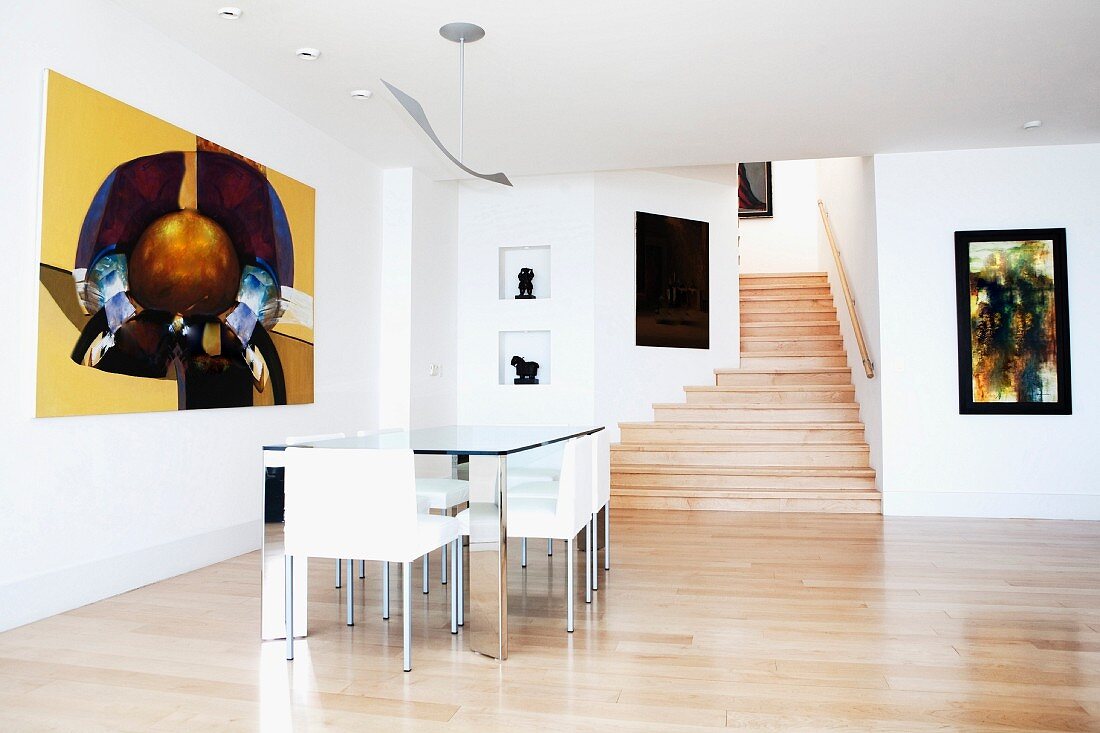 Dining table and chairs in open interior