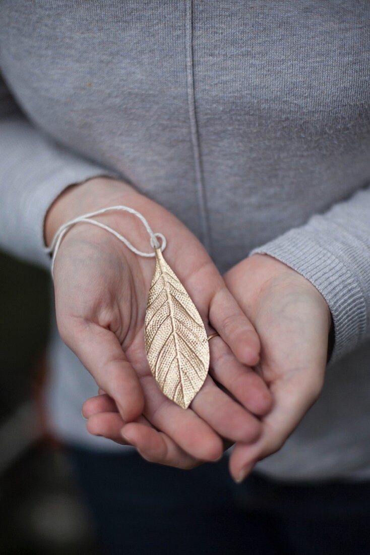 Gold leaf-shaped pendant