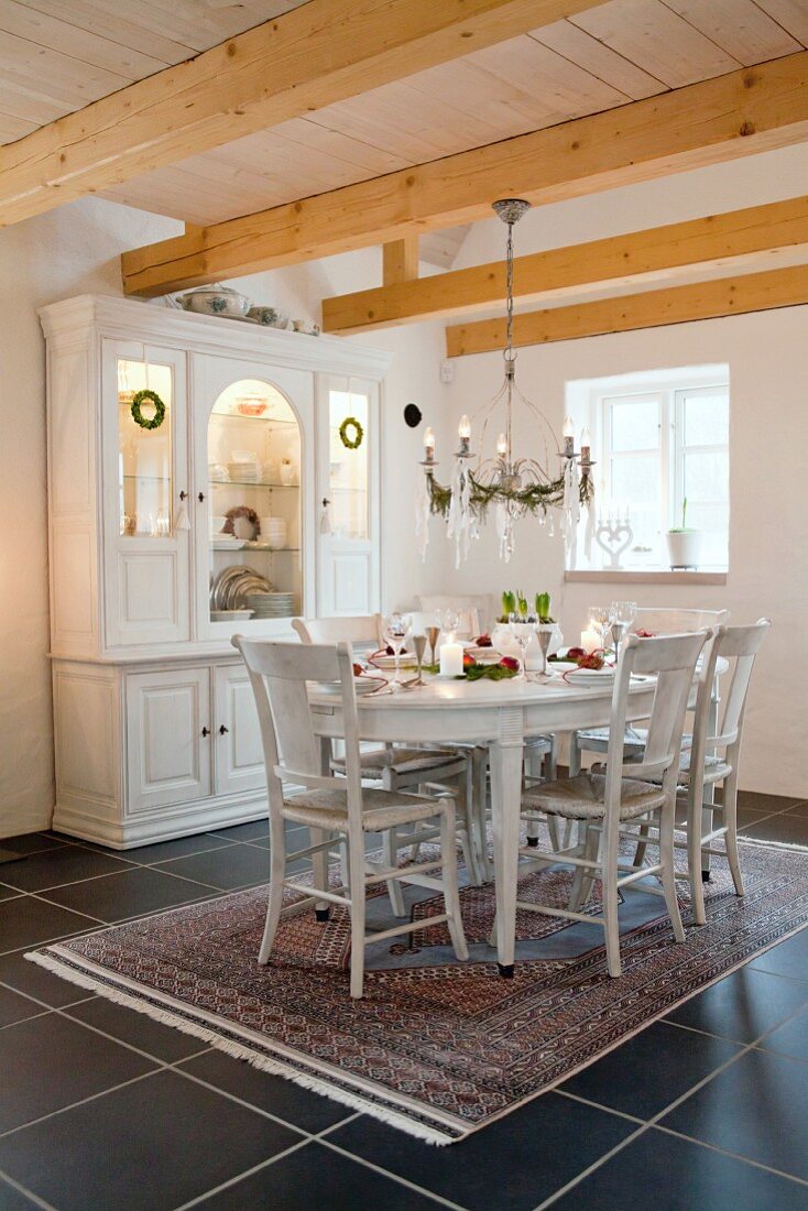 Festively decorated dining area in Scandinavian country house