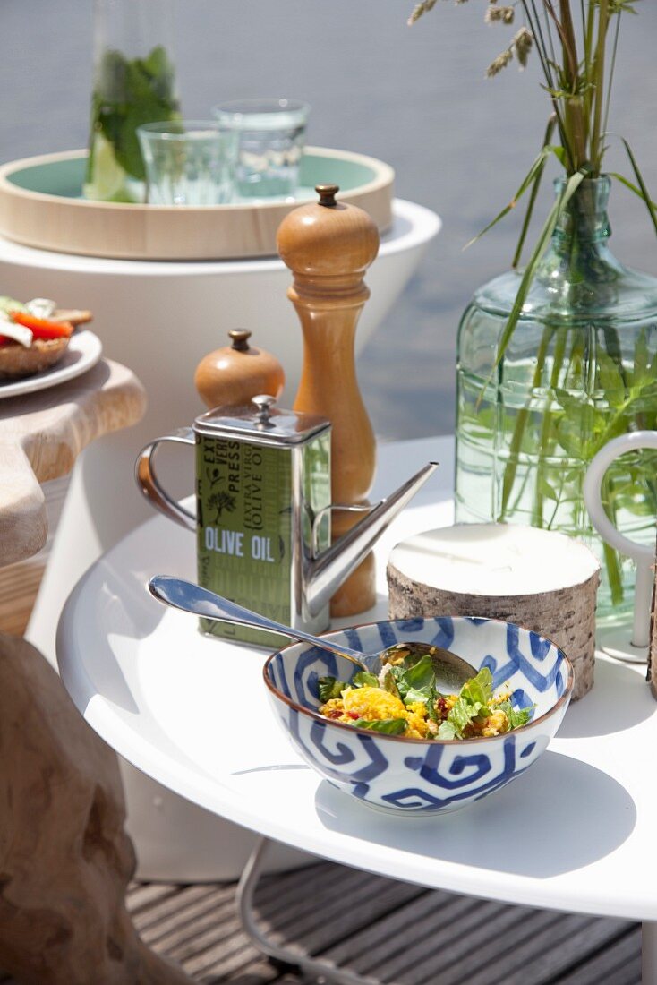 Summer picnic arranged on three side tables