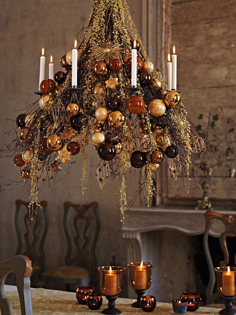 Chandelier lavishly decorated with baubles in shades of brown