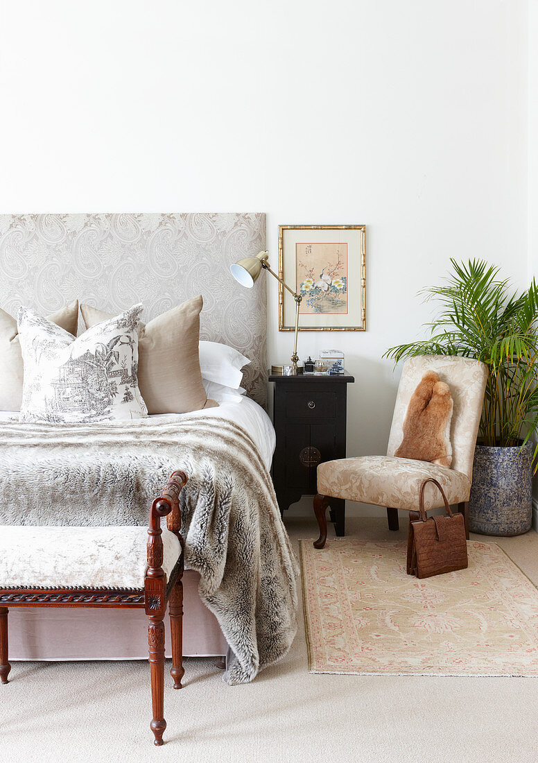 Elegant bedroom in pale grey and beige