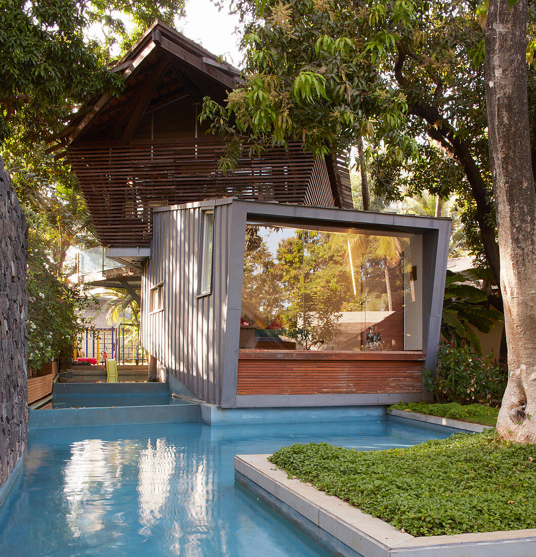 Exotic cubist architect-designed house next to pool