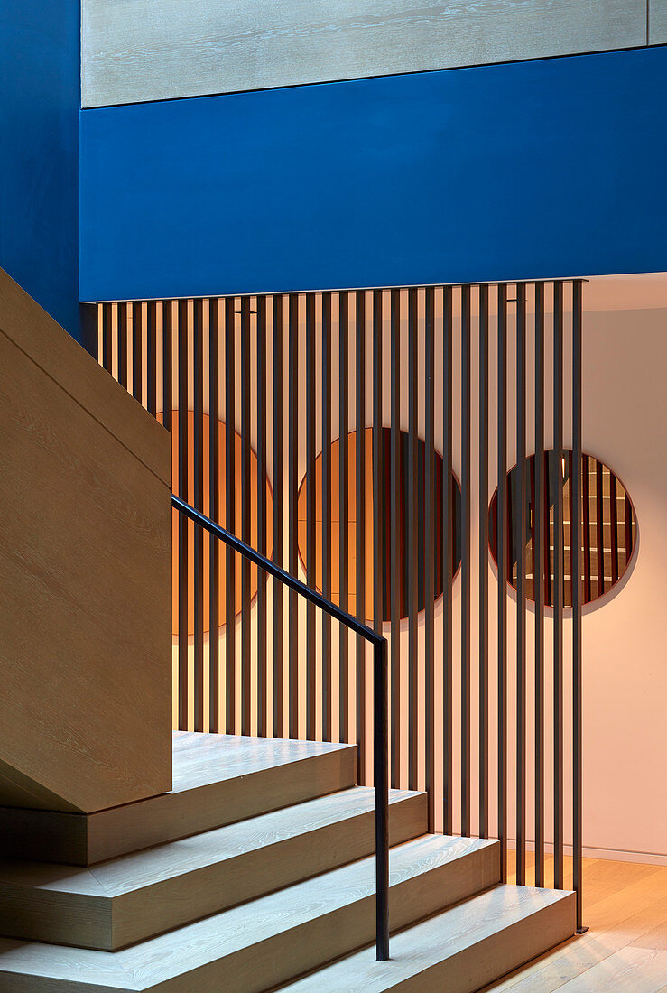 Patterns of geometric shapes and colours in hallway and stairwell
