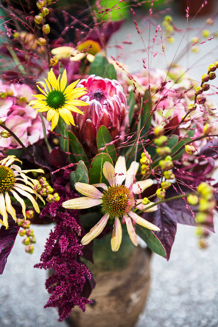 Autumnal bouquet in purple and yellow