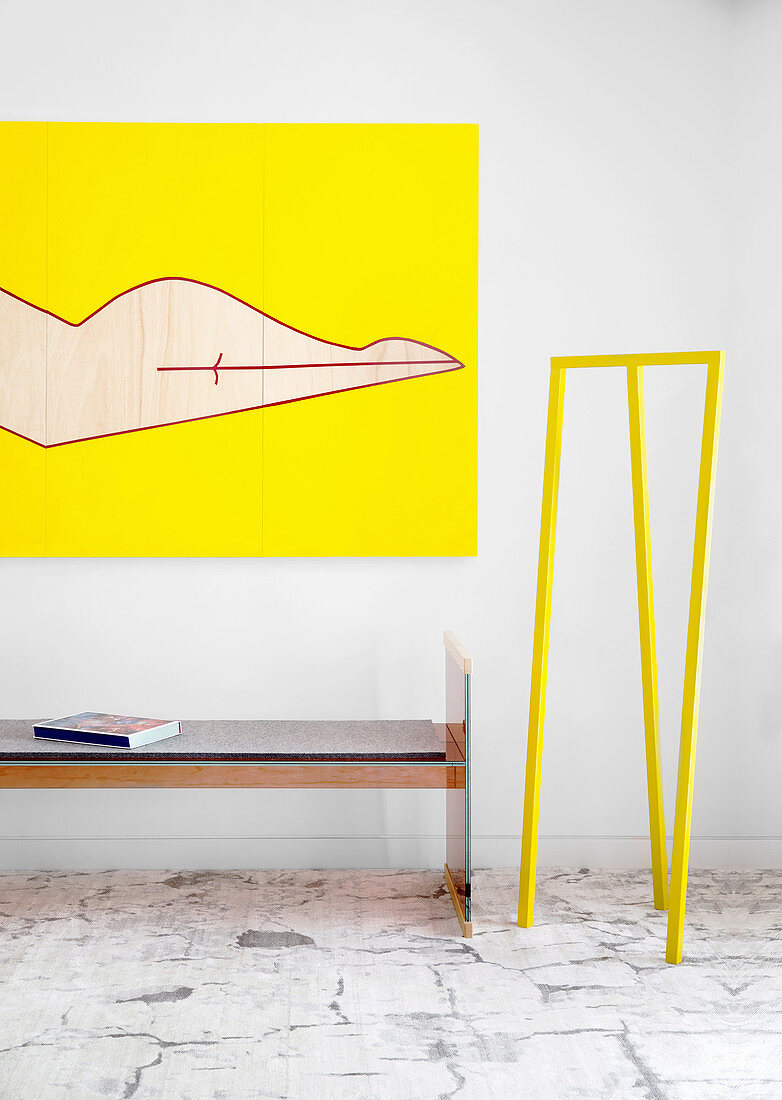 Designer bench, modern art and yellow designer coat stand