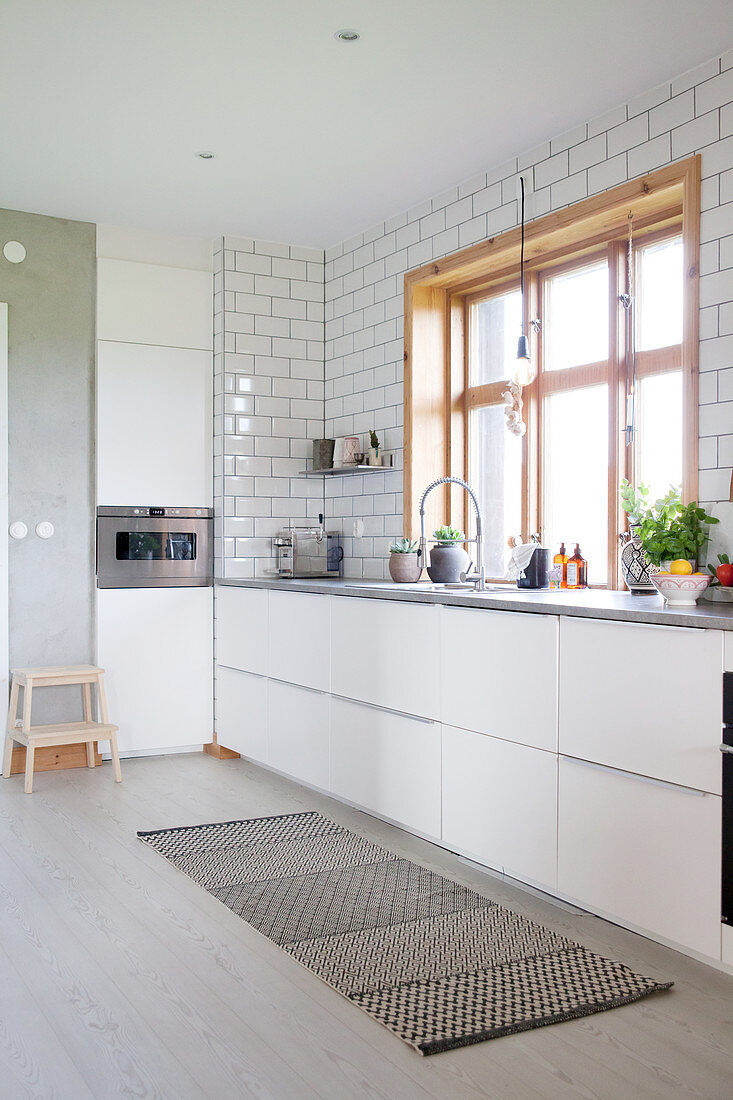 Modern, white fitted kitchen