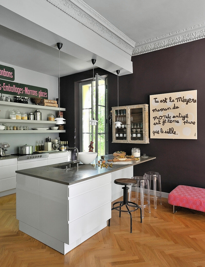 Eclectic mixture of modern styles in kitchen of French period apartment
