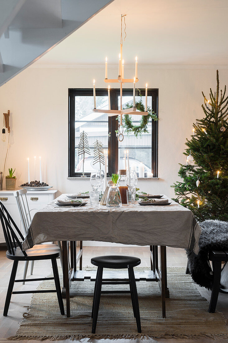 Simply decorated table in festive dining room