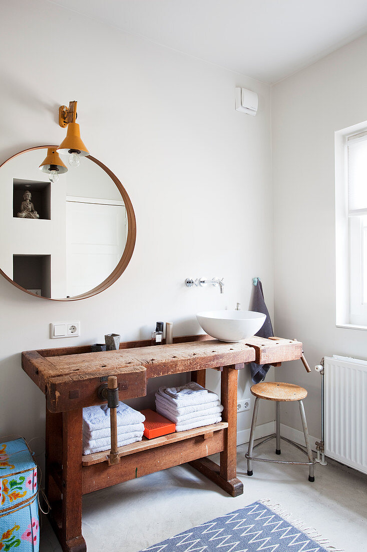 Old wooden workbench used as washstand