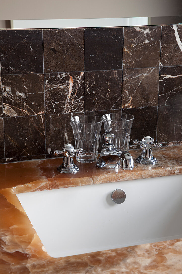 Brown gemstone surface and dark marble tiles