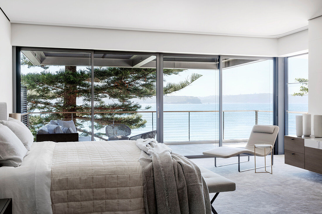 Elegant bedroom with panoramic sea views