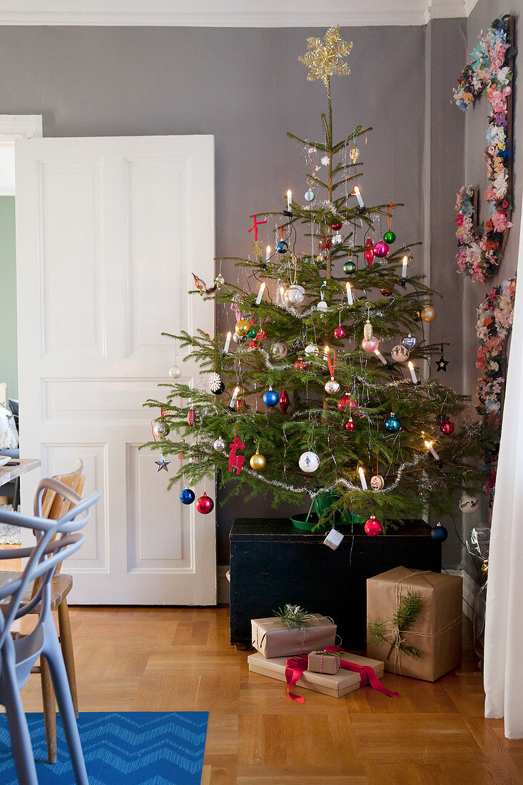 Decorated Christmas tree in dining room