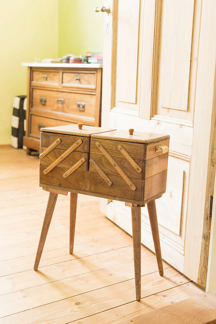 Old sewing box with legs