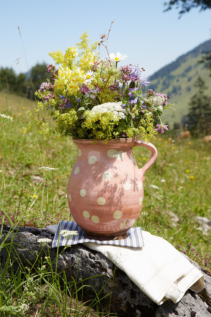 Bunch of wildflowers in jug