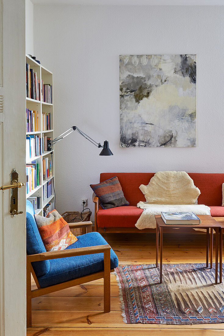 Retro seating with blue and red upholstery in living room