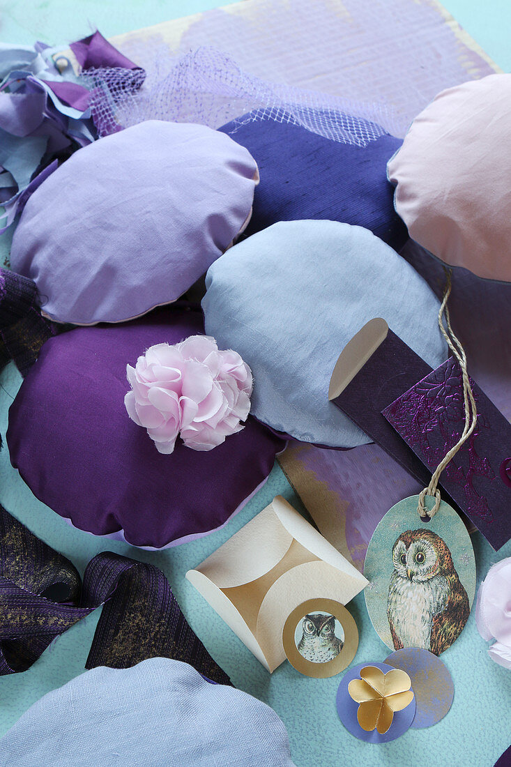 Small round cushions in various shades of purple