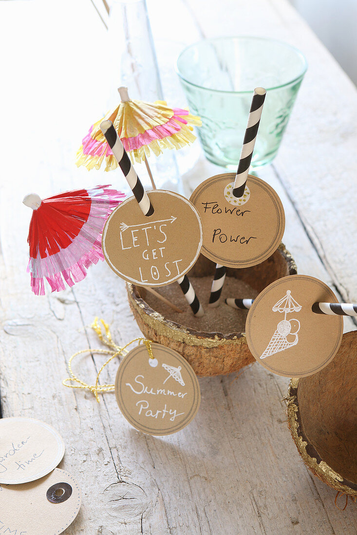 Hand-crafted paper tags on drinking straws