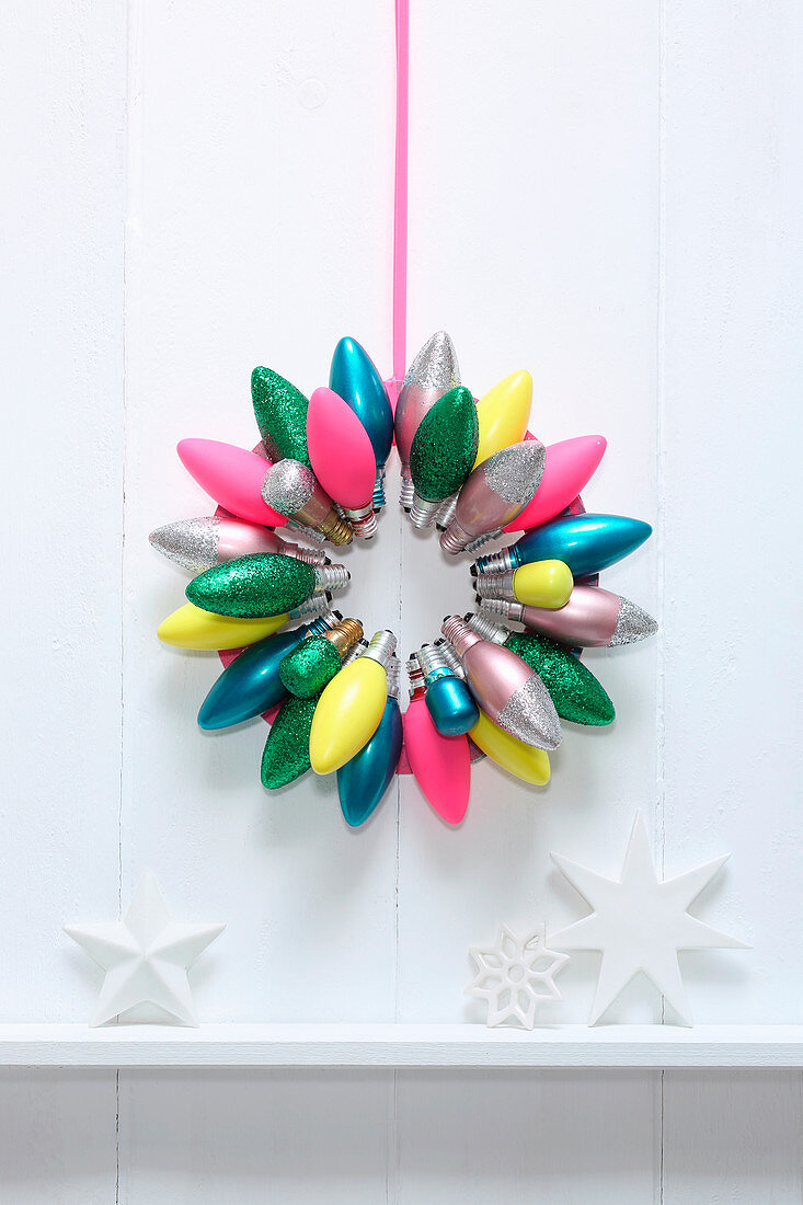 Christmas wreath made from colourfully painted light bulbs