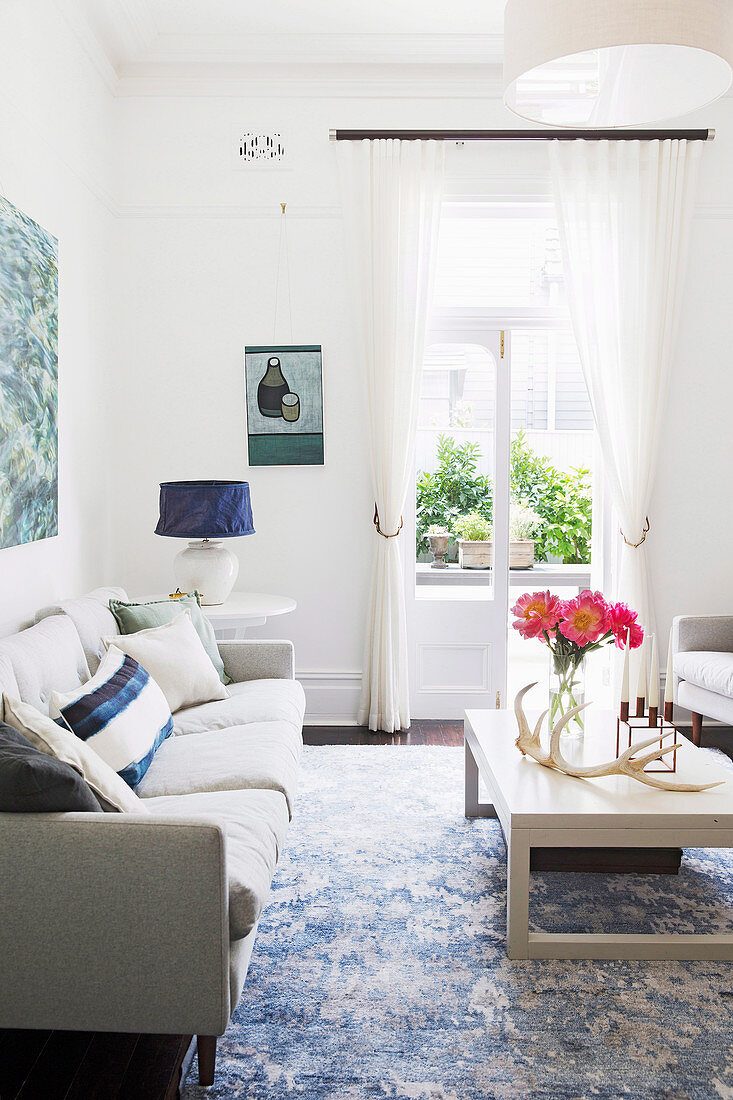 Bright living room in white and blue