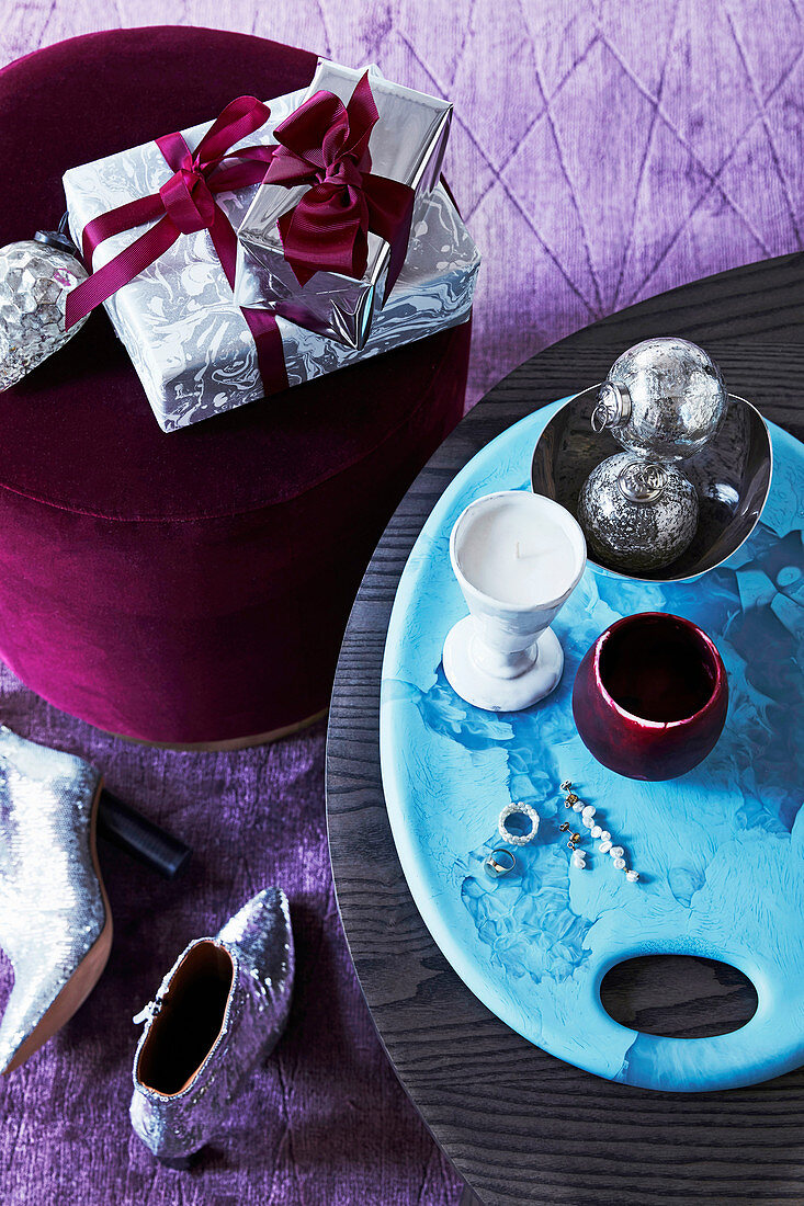 Gifts and Christmas decorations in silver, turquoise and violet