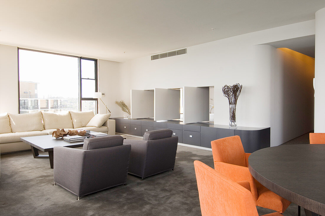 Flexible wall panels between bedroom and living room in modern interior