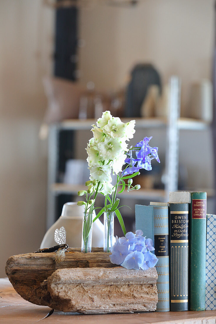 Driftwood bookend decorated with summer flowers