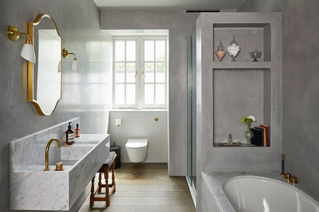 Elegant modern bathroom in shades of grey with marble sink
