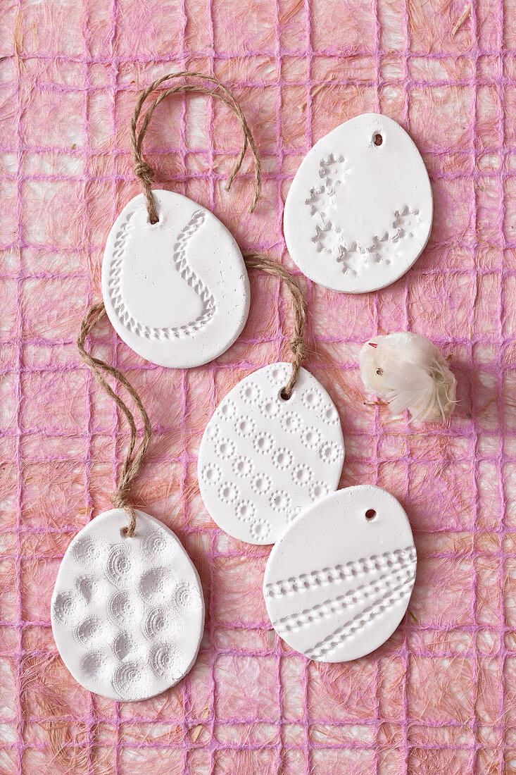 Modelling clay eggs embossed with various patterns