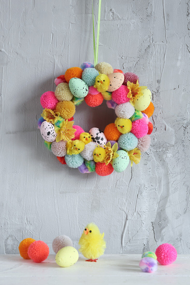 Colourful wreath of pompoms, chicks and Eater eggs