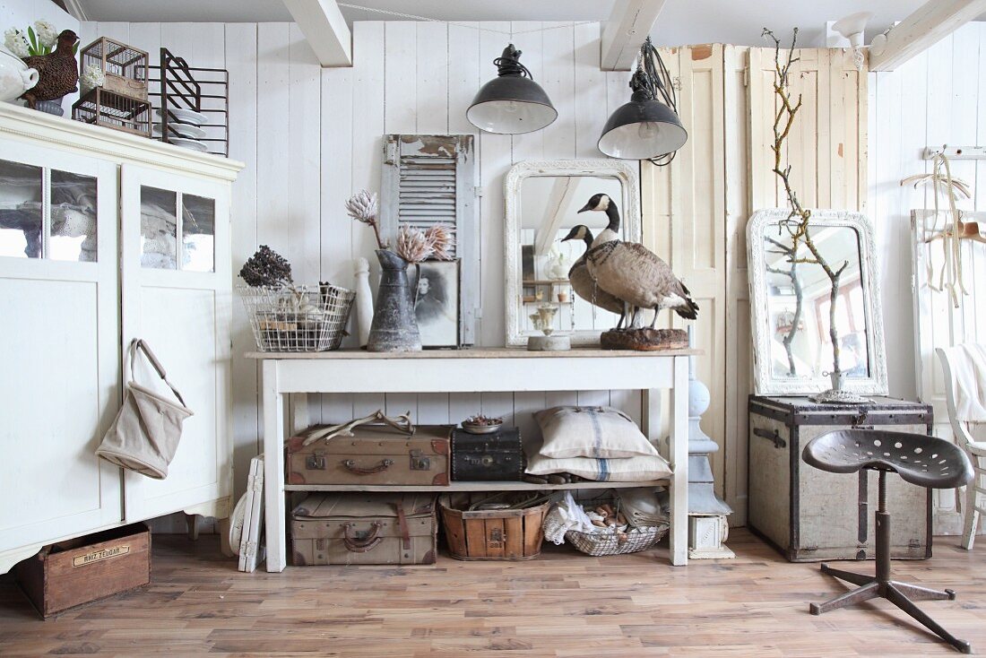Collection of various vintage pieces in white interior