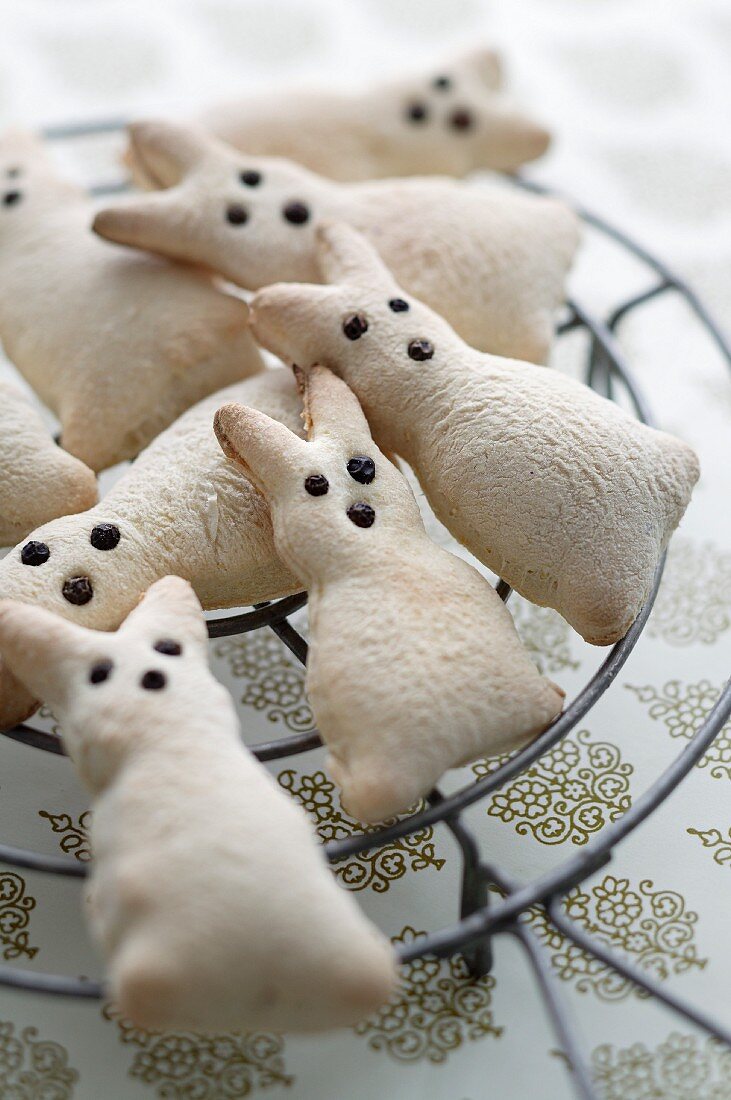 Easter bunnies made of pizza dough on a cooling rack