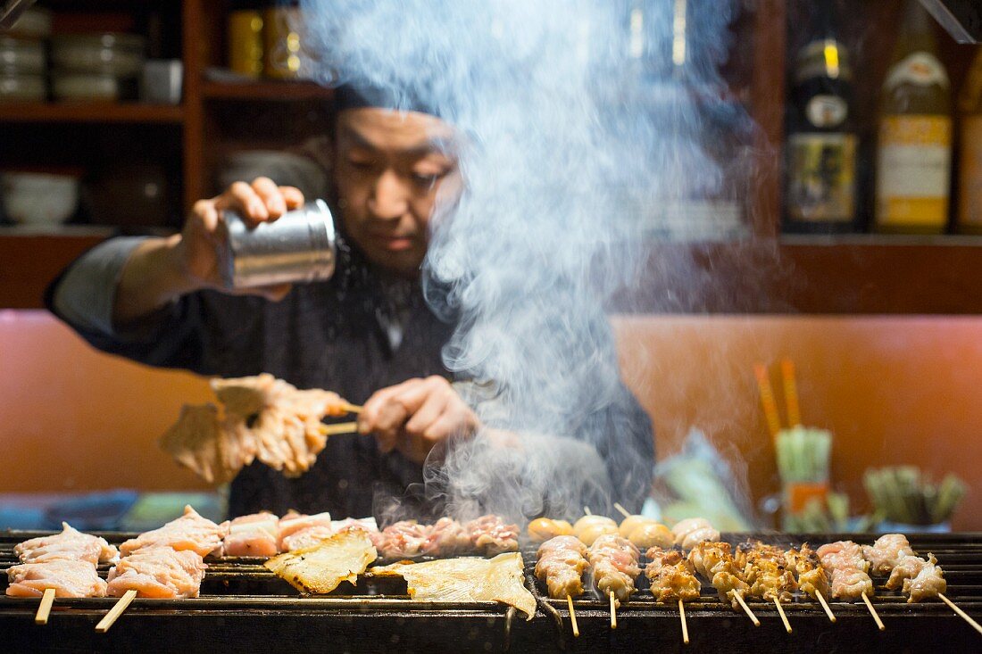 Grilled chicken skewers at the 'Tori Komachi' sake bar in Japan